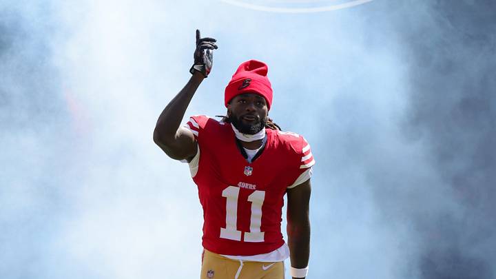 Oct 1, 2023; Santa Clara, California, USA; San Francisco 49ers wide receiver Brandon Aiyuk (11) runs onto the field before the game against the Arizona Cardinals at Levi's Stadium. Mandatory Credit: Sergio Estrada-Imagn Images