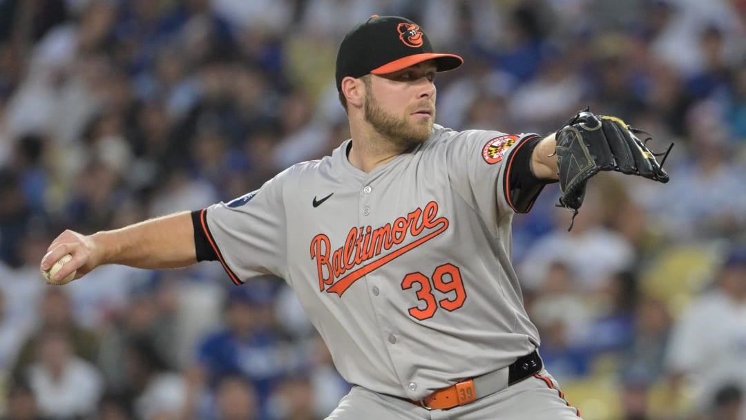 Aug 28, 2024; Los Angeles, California, USA;  Baltimore Orioles starting pitcher Corbin Burnes (39) delivers to the plate in the first inning against the Los Angeles Dodgers at Dodger Stadium. Mandatory Credit: Jayne Kamin-Oncea-USA TODAY Sports