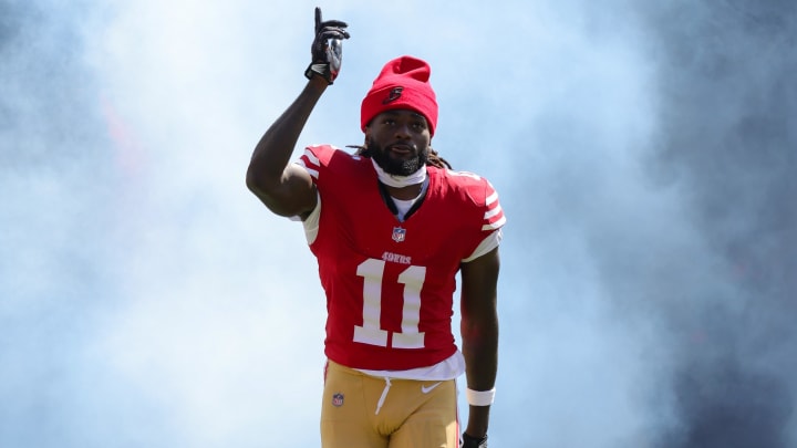 Oct 1, 2023; Santa Clara, California, USA; San Francisco 49ers wide receiver Brandon Aiyuk (11) runs onto the field before the game against the Arizona Cardinals at Levi's Stadium. Mandatory Credit: Sergio Estrada-USA TODAY Sports