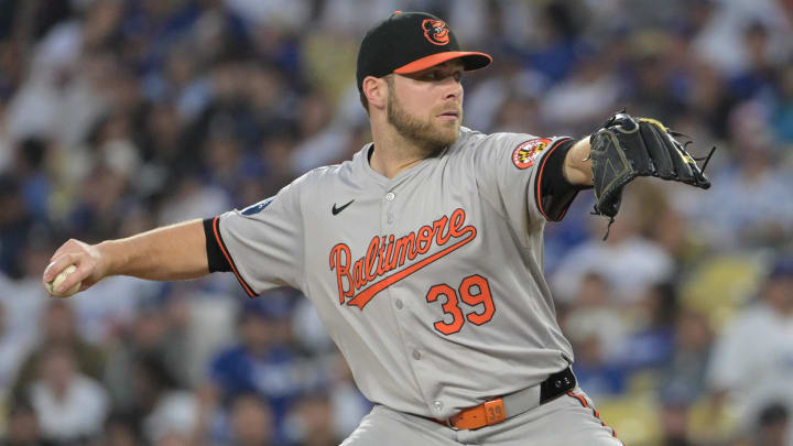 Aug 28, 2024; Los Angeles, California, USA;  Baltimore Orioles starting pitcher Corbin Burnes (39) delivers to the plate in the first inning against the Los Angeles Dodgers at Dodger Stadium.