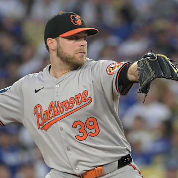 Aug 28, 2024; Los Angeles, California, USA;  Baltimore Orioles starting pitcher Corbin Burnes (39) delivers to the plate in the first inning against the Los Angeles Dodgers at Dodger Stadium. 