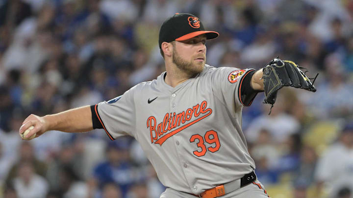 Aug 28, 2024; Los Angeles, California, USA;  Baltimore Orioles starting pitcher Corbin Burnes (39) delivers to the plate in the first inning against the Los Angeles Dodgers at Dodger Stadium. 