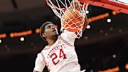 Arkansas Razorbacks forward Billy Richmond III (24) scores against the Duke Blue Devils during the first half at United Center.