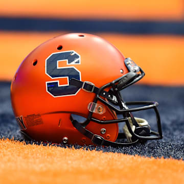 Sep 16, 2017; Syracuse, NY, USA; General view of a Syracuse Orange helmet on the turf prior to the game against the Central Michigan Chippewas at the Carrier Dome. Mandatory Credit: Rich Barnes-Imagn Images