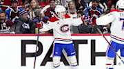 Jan 4, 2025; Denver, Colorado, USA; Montreal Canadiens right wing Cole Caufield (13) celebrates his game tying goal in the third period against the Colorado Avalanche at Ball Arena. Mandatory Credit: Ron Chenoy-Imagn Images