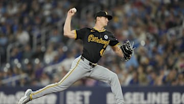 Jun 2, 2024; Toronto, Ontario, CAN; Pittsburgh Pirates starting pitcher Quinn Priester (46) pitches to the Toronto Blue Jays during the first inning at Rogers Centre. Mandatory Credit: John E. Sokolowski-Imagn Images