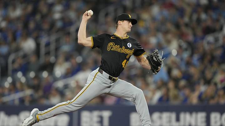 Jun 2, 2024; Toronto, Ontario, CAN; Pittsburgh Pirates starting pitcher Quinn Priester (46) pitches to the Toronto Blue Jays during the first inning at Rogers Centre. Mandatory Credit: John E. Sokolowski-Imagn Images