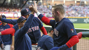Boston Red Sox SS Trevor Story, manager Alex Cora