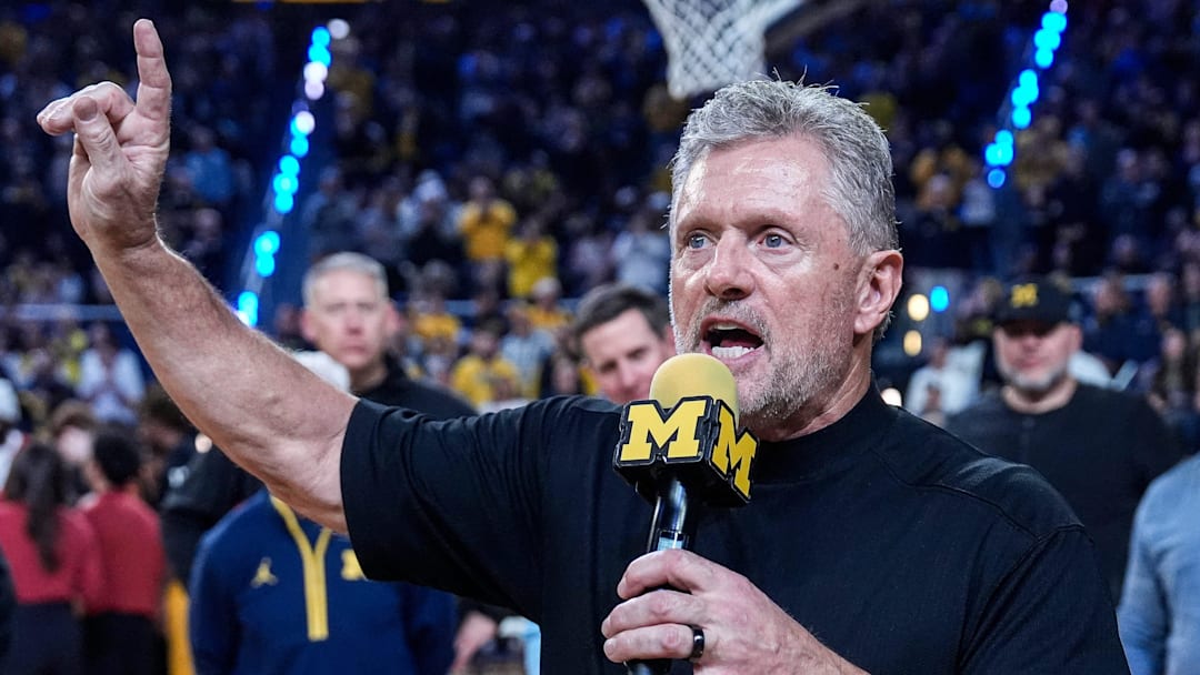 Michigan football head coach Kyle Whittingham speaks as he is being introduced on the floor during the first half between Michigan and USC at Crisler Center in Ann Arbor on Friday, Jan. 2, 2026.