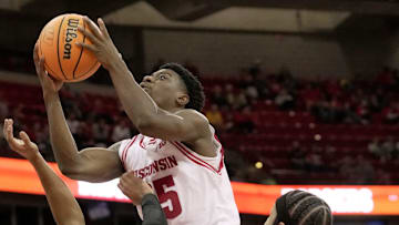 John Blackwell (25) fouls Nick Boyd (2) during a Wisconsin men’s basketball scrimmage Sunday, October 19, 2025 at the Kohl Center in Madison, Wisconsin.
