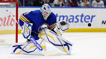 Nov 9, 2024; Buffalo, New York, USA;  Buffalo Sabres goaltender Ukko-Pekka Luukkonen (1) looks to make a save during the first period against the Calgary Flames at KeyBank Center. Mandatory Credit: Timothy T. Ludwig-Imagn Images