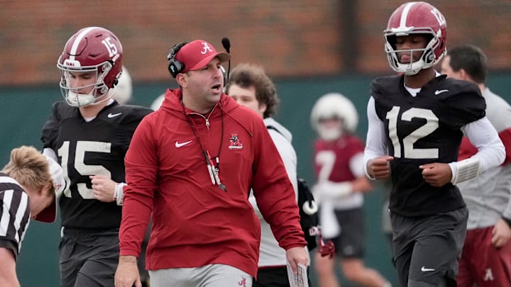 Mar 5, 2025; Tuscaloosa, AL, USA; Quarterbacks coach Nick Seridan walks between quarterbacks Ty Simpson (15) and Keelon Russell (12)during Spring Practice for the Crimson Tide.
