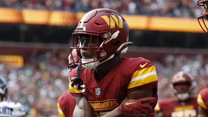 Oct 29, 2023; Landover, Maryland, USA; Washington Commanders wide receiver Terry McLaurin (17) celebrates after catching a touchdown pass against the Philadelphia Eagles during the first quarter at FedExField. Mandatory Credit: Geoff Burke-USA TODAY Sports