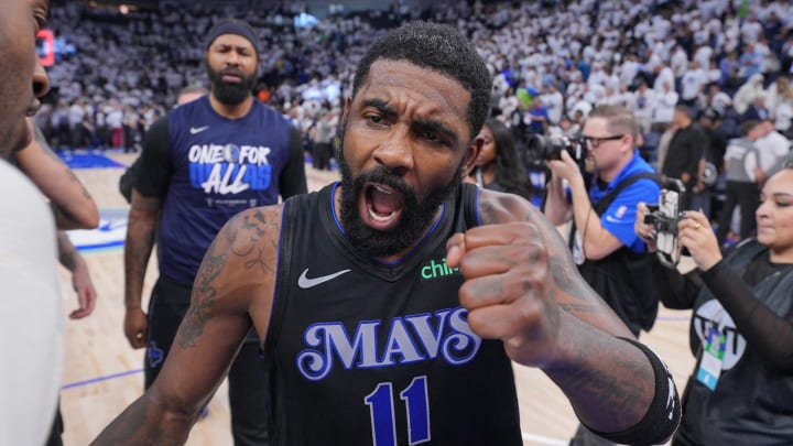 May 24, 2024; Minneapolis, Minnesota, USA; Dallas Mavericks guard Kyrie Irving (11) celebrates after defeating the Minnesota Timberwolves in game two of the western conference finals for the 2024 NBA playoffs at Target Center. Mandatory Credit: Brad Rempel-USA TODAY Sports