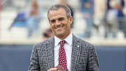  South Carolina Gamecocks head coach Shane Beamer holds a football and reacts on the field before the game against the Mississippi Rebels at Vaught-Hemingway Stadium.