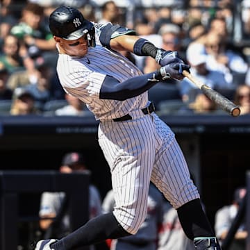 New York Yankees center fielder Aaron Judge (99) hits a two-run home run in the third inning against the Boston Red Sox at Yankee Stadium on Sept 15.