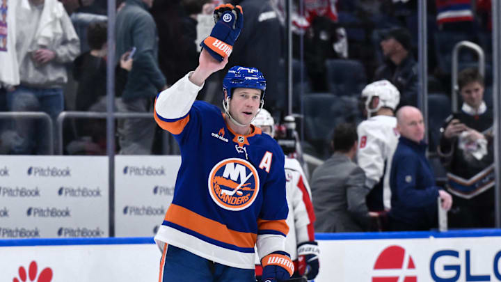 Apr 15, 2025; Elmont, New York, USA; New York Islanders left wing Matt Martin (17) acknowledges the crowd after the game against the Washington Capitals at UBS Arena. Mandatory Credit: John Jones-Imagn Images