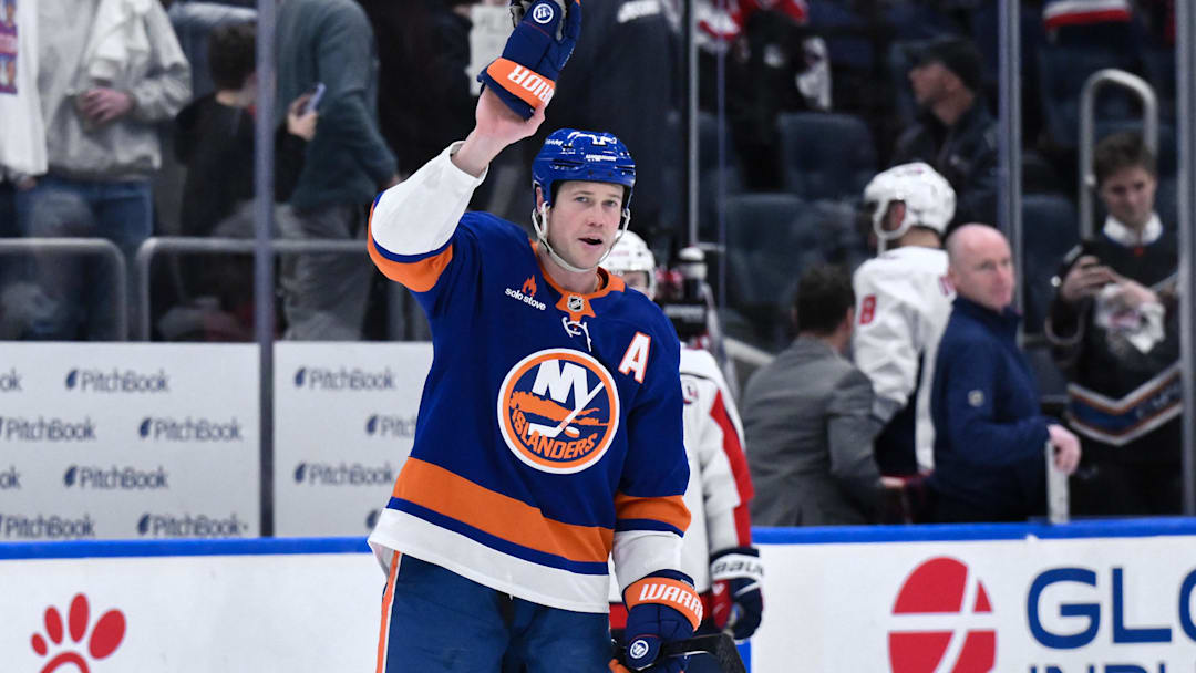 Apr 15, 2025; Elmont, New York, USA; New York Islanders left wing Matt Martin (17) acknowledges the crowd after the game against the Washington Capitals at UBS Arena. Mandatory Credit: John Jones-Imagn Images
