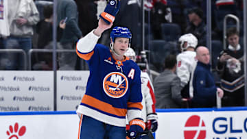 Apr 15, 2025; Elmont, New York, USA; New York Islanders left wing Matt Martin (17) acknowledges the crowd after the game against the Washington Capitals at UBS Arena. Mandatory Credit: John Jones-Imagn Images