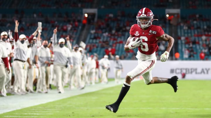 Jan 11, 2021; Miami Gardens, Florida, USA; Alabama Crimson Tide wide receiver DeVonta Smith (6) scores a touchdown against the Ohio State Buckeyes in the 2021 College Football Playoff National Championship Game. Mandatory Credit: Mark J. Rebilas-USA TODAY Sports