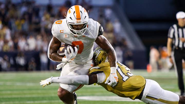 Sep 12, 2026; Atlanta, Georgia, USA; Tennessee Volunteers tight end Ethan Davis (0) is tackled by Georgia Tech Yellow Jackets safety Savion Riley (13) in the second quarter at Bobby Dodd Stadium at Hyundai Field. Mandatory Credit: Brett Davis-Imagn Images