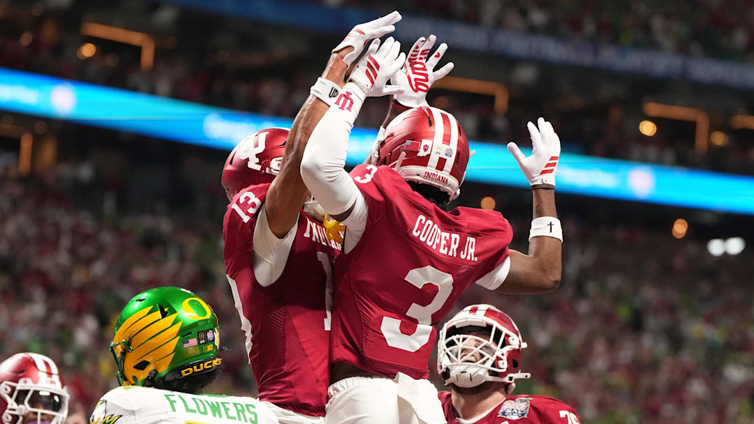 Jan 9, 2026; Atlanta, GA, USA; Indiana Hoosiers wide receivers Omar Cooper Jr. (3) and Elijah Sarratt (13) celebrate Cooper's touchdown catch during the first half of the 2025 Peach Bowl and semifinal game of the College Football Playoff.