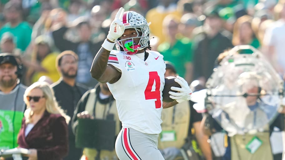 Ohio State receiver Jeremiah Smith scores a touchdown during a College Football Playoff game against Oregon.
