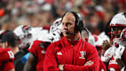 Nov 1, 2025; Raleigh, North Carolina, USA;  NC State Wolfpack head coach Dave Doeren during the first quarter at Carter-Finley Stadium. Mandatory Credit: Zachary Taft-Imagn Images