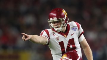 Dec 29, 2017; Arlington, TX, USA; Southern California Trojans quarterback Sam Darnold (14) signals prior to the snap of the ball against the Ohio State Buckeyes in the 2017 Cotton Bowl at AT&T Stadium. Mandatory Credit: Matthew Emmons-USA TODAY Sports