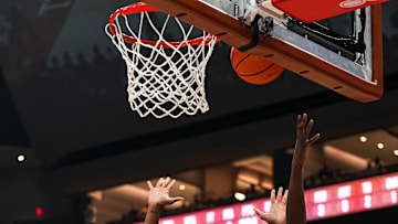University of Connecticut guard Hassan Diarra (10) shoots over Texas Longhorns guard Tramon Mark (12) during the game at the Moody Center on Sunday, Dec. 8, 2024.