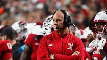 Nov 1, 2025; Raleigh, North Carolina, USA;  NC State Wolfpack head coach Dave Doeren during the first quarter at Carter-Finley Stadium. Mandatory Credit: Zachary Taft-Imagn Images