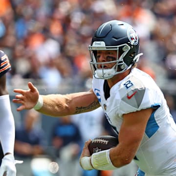 Sep 8, 2024; Chicago, Illinois, USA; Tennessee Titans quarterback Will Levis (8) reacts after a first down against the Chicago Bears during the second quarter at Soldier Field. Mandatory Credit: Mike Dinovo-Imagn Images