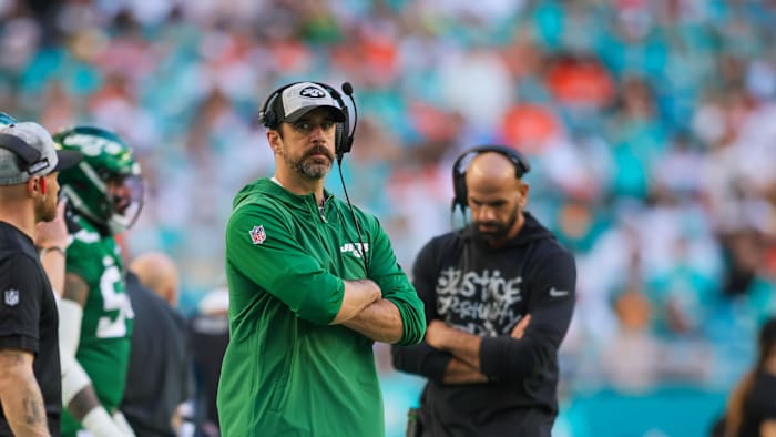 Dec 17, 2023; Miami Gardens, Florida, USA; New York Jets quarterback Aaron Rodgers (8) looks on from