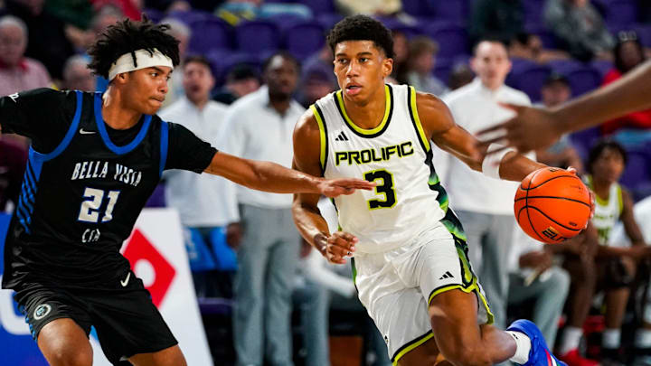 Prolific Prep Crew guard Bruce Branch II (3) drives to the basket as CIA-Bella Vista Bears guard Lyris Robinson (21) guards him during the first quarter of a City of Palms Classic Signature Series game at Suncoast Credit Union Arena in Fort Myers, Fla., on Friday, Dec. 19, 2025.