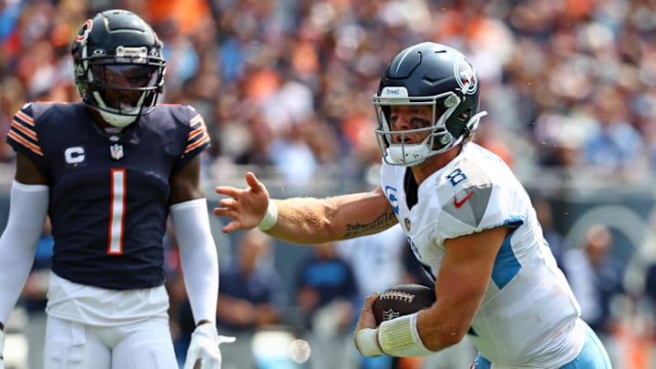 Sep 8, 2024; Chicago, Illinois, USA; Tennessee Titans quarterback Will Levis (8) reacts after a first down against the Chicago Bears during the second quarter at Soldier Field. Mandatory Credit: Mike Dinovo-Imagn Images