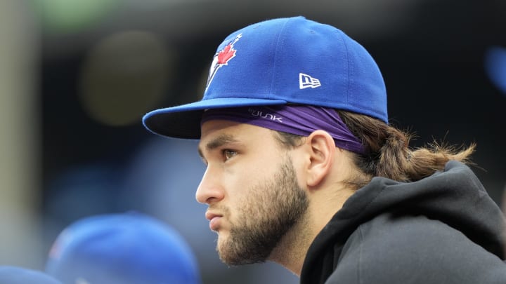 An inured Toronto Blue Jays shortstop Bo Bichette (11) sits in the durgout during the second inning against the Boston Red Sox at Rogers Centre on June 18.