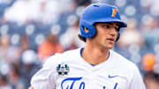 Florida Gators first baseman Jac Caglianone (14) runs after hitting a home run against the Kentucky Wildcats during the sixth inning at Charles Schwab Field Omaha. The 75th home run of his career, Caglianone breaks the Florida all-time home run record previously held by Matt LaPorta.