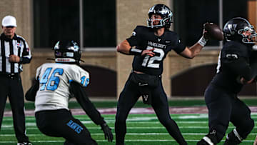 Vandegrift quarterback Miles Teodecki (12) throws a pass during the Class 6A Division II regional final playoff game against San Antonio Harlan at UFCU Stadium on Friday, Dec. 6, 2024 in San Marcos, Texas.