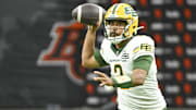 Jun 7, 2025; Vancouver, British Columbia, Canada;  Edmonton Elks quarterback Tre Ford (2) looks to pass the ball during the second half against the BC Lions at BC Place Stadium. Mandatory Credit: Anne-Marie Sorvin-Imagn Images