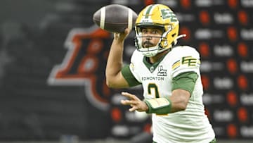 Jun 7, 2025; Vancouver, British Columbia, Canada;  Edmonton Elks quarterback Tre Ford (2) looks to pass the ball during the second half against the BC Lions at BC Place Stadium. Mandatory Credit: Anne-Marie Sorvin-Imagn Images