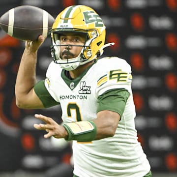 Jun 7, 2025; Vancouver, British Columbia, Canada;  Edmonton Elks quarterback Tre Ford (2) looks to pass the ball during the second half against the BC Lions at BC Place Stadium. Mandatory Credit: Anne-Marie Sorvin-Imagn Images