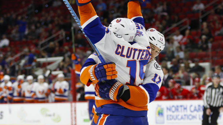 Mar 26, 2016; Raleigh, NC, USA; New York Islanders forward Cal Clutterbuck (15) celebrates his 3rd