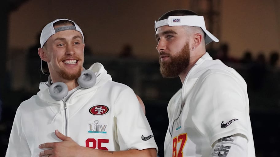 San Francisco 49ers tight end George Kittle (85) greets Kansas City Chiefs tight end Travis Kelce. | Kirby Lee-Imagn Images