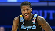 Jan 28, 2025; Indianapolis, Indiana, USA; Marquette Golden Eagles guard Kam Jones (1) celebrates after defeating the Butler Bulldogs at Hinkle Fieldhouse. Mandatory Credit: Robert Goddin-Imagn Images