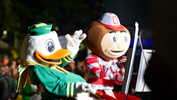 The Duck and Brutus Buckeye paint during ESPN’s “College GameDay” Saturday, Oct. 12, 2024 on the campus of the University of Oregon in Eugene, Ore.