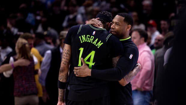 Mar 15, 2024; New Orleans, Louisiana, USA;  New Orleans Pelicans head coach Willie Green talks with forward Brandon Ingram (14) after the game against the LA Clippers at Smoothie King Center. Mandatory Credit: Stephen Lew-USA TODAY Sports