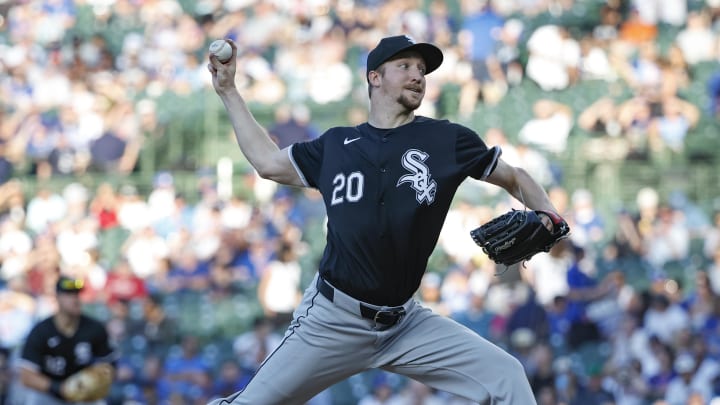 Jun 5, 2024; Chicago, Illinois, USA; Chicago White Sox starting pitcher Erick Fedde (20) delivers a pitch against the Chicago Cubs during the first inning at Wrigley Field. Mandatory Credit: Kamil Krzaczynski-USA TODAY Sports. 