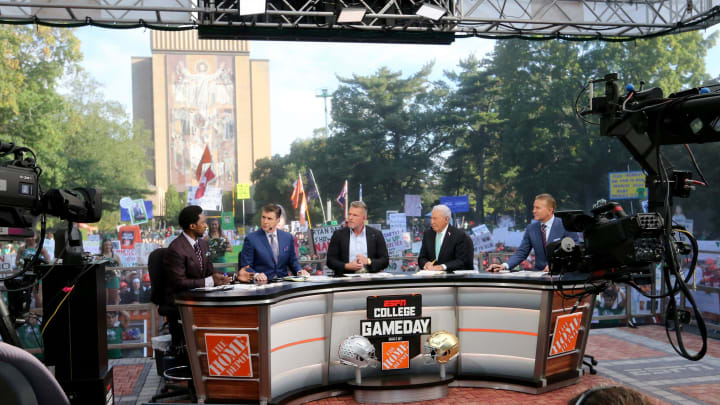 All five hosts are exchanging sports views during the ESPN College GameDay show on Saturday, Sept. 23, 2023, on the Hesburgh Library lawn on the University of Notre Dame campus in South Bend. The show was to highlight the Notre Dame-Ohio State game.