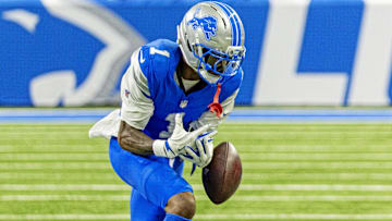 Detroit Lions wide receiver Jameson Williams (1) drops a catch during the second half against the Cleveland Browns at Ford Field.
