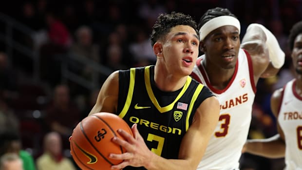 February 1, 2024; Los Angeles, California, USA; Oregon Ducks guard Jackson Shelstad (3) drives to the basket past the USC Trojans